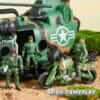"Military helicopter toy with accompanying soldiers and motorcycle in a simulated battlefield environment."